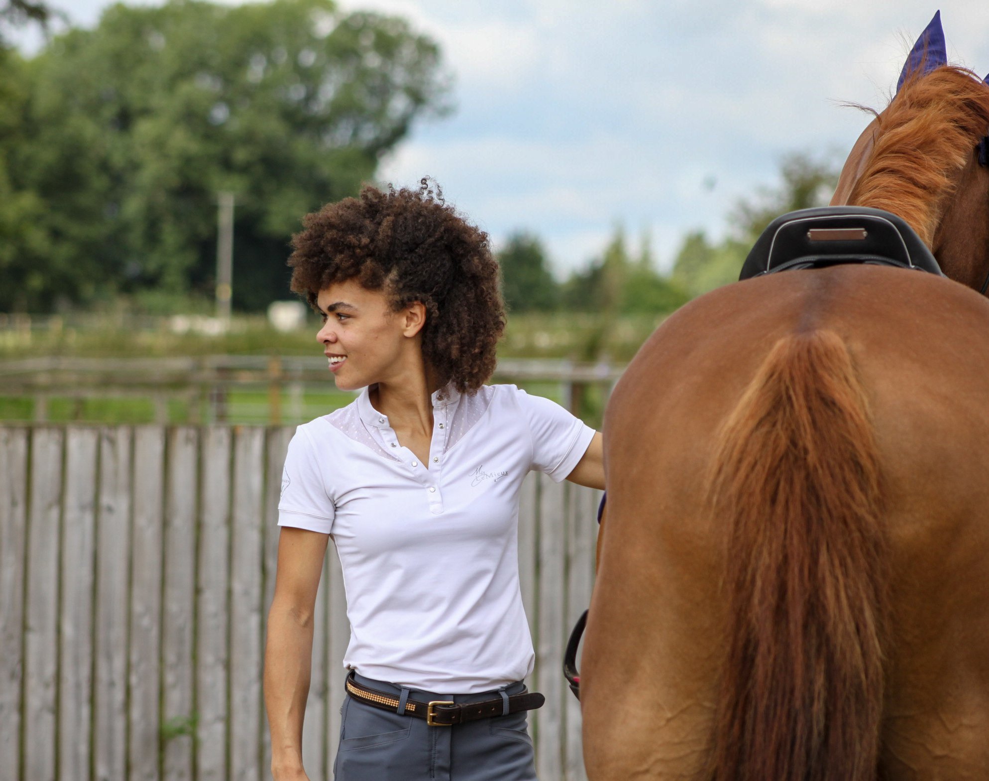 Lydia working with a horse on the ground